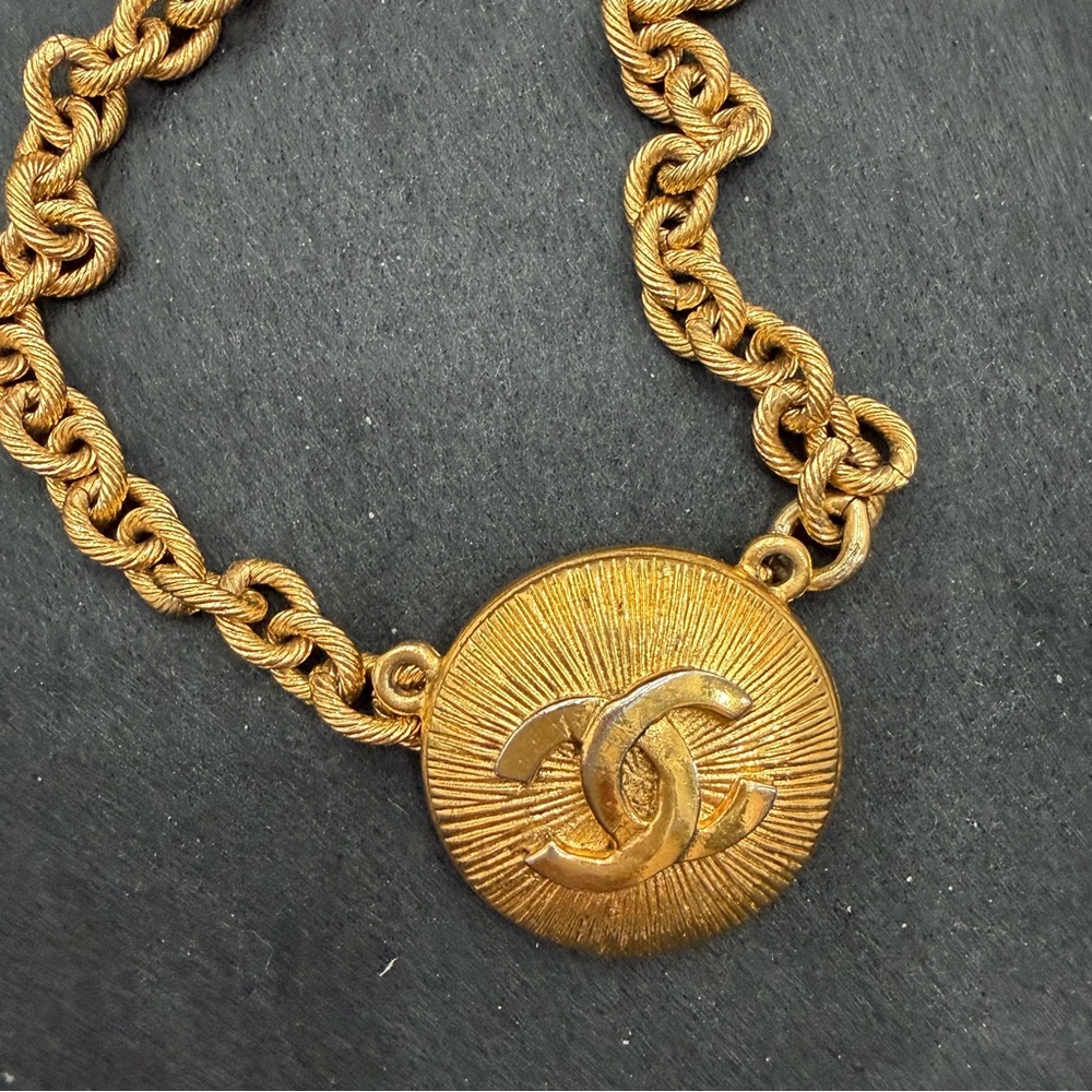 Radiant Gold Toned Chanel Pendant with a Chain bracelet - Picture 3 of 3